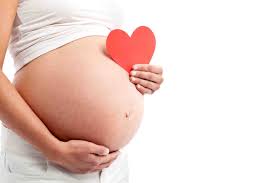 pregnant with heart2 - Happy Pregnancy - the joys of pregnancy massage